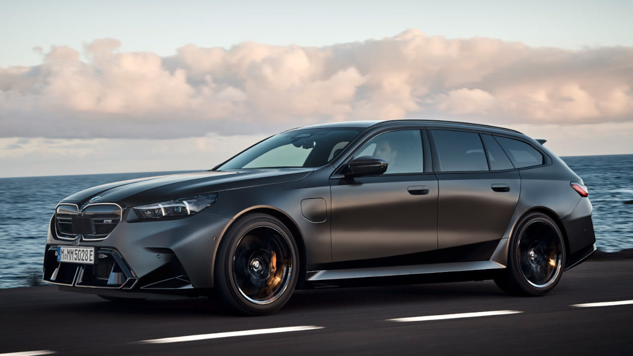 Black BMW M5 Touring Driving