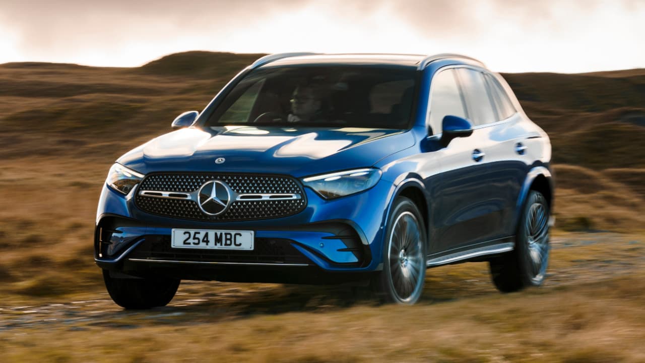 Blue Mercedes-Benz GLC 300e driving