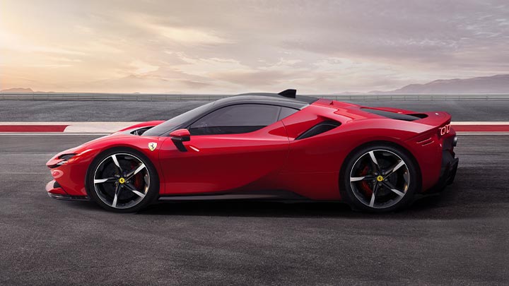 Side parked shot of a red Ferrari SF90
