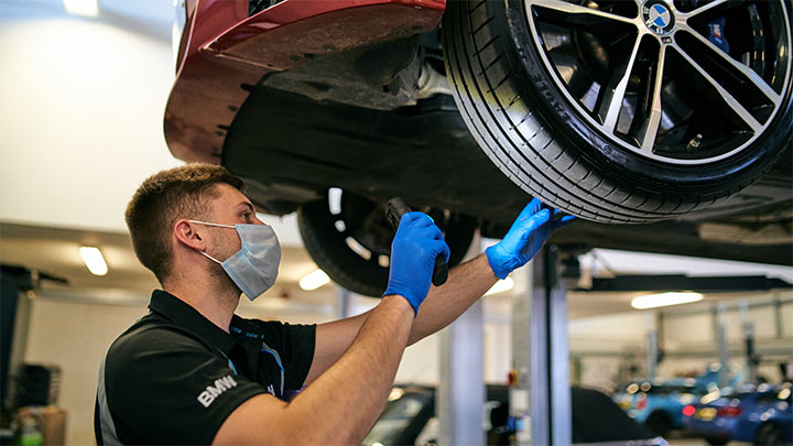 technician performing vehicle health check