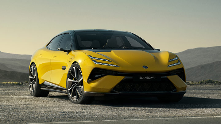 Yellow Lotus Emeya parked with a mountain backdrop