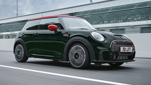 Green MINI Hatch John Cooper Works, driving on track